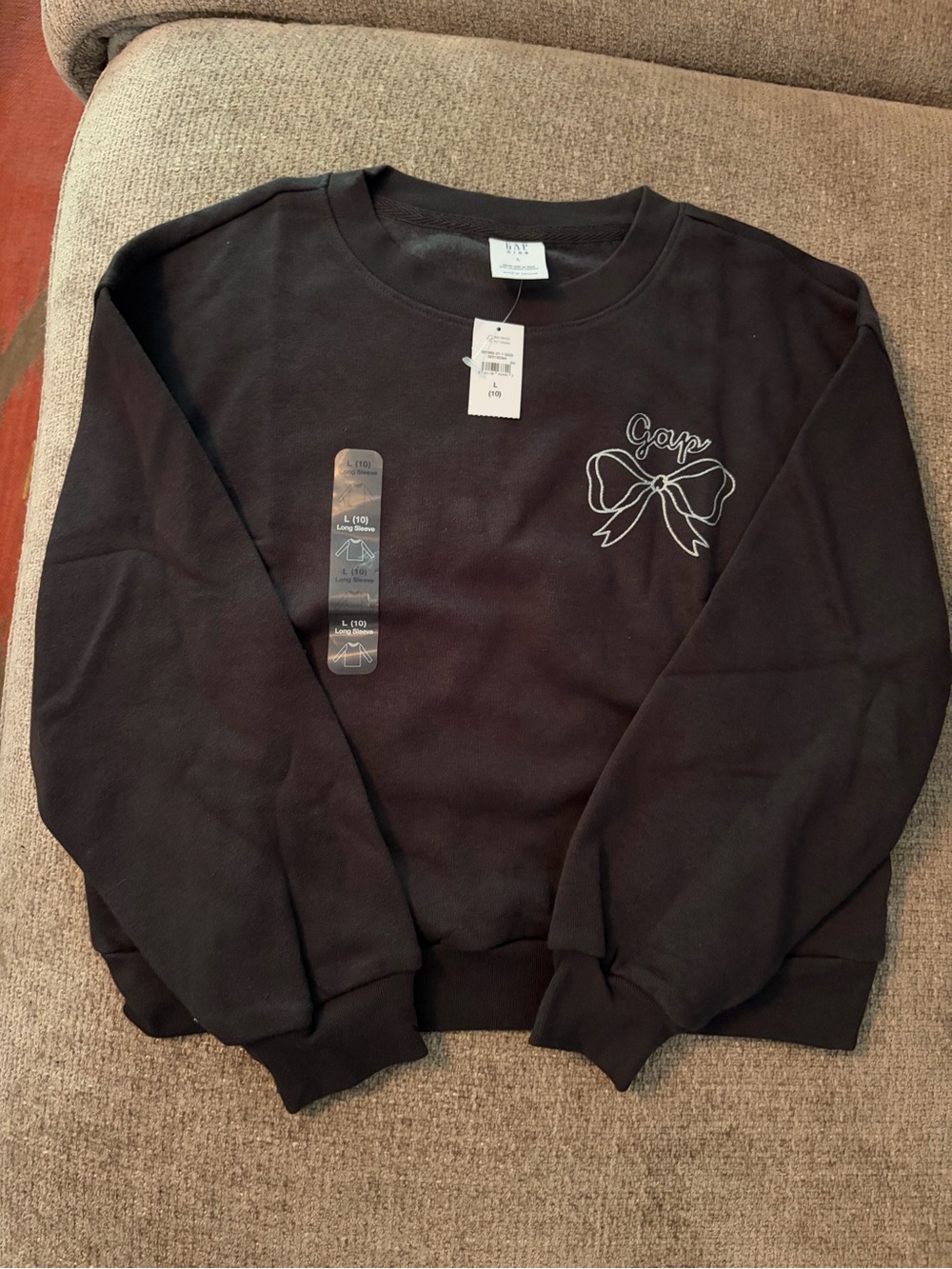 Girls GAP sweatshirt with silver bow design NWT size 10 Large